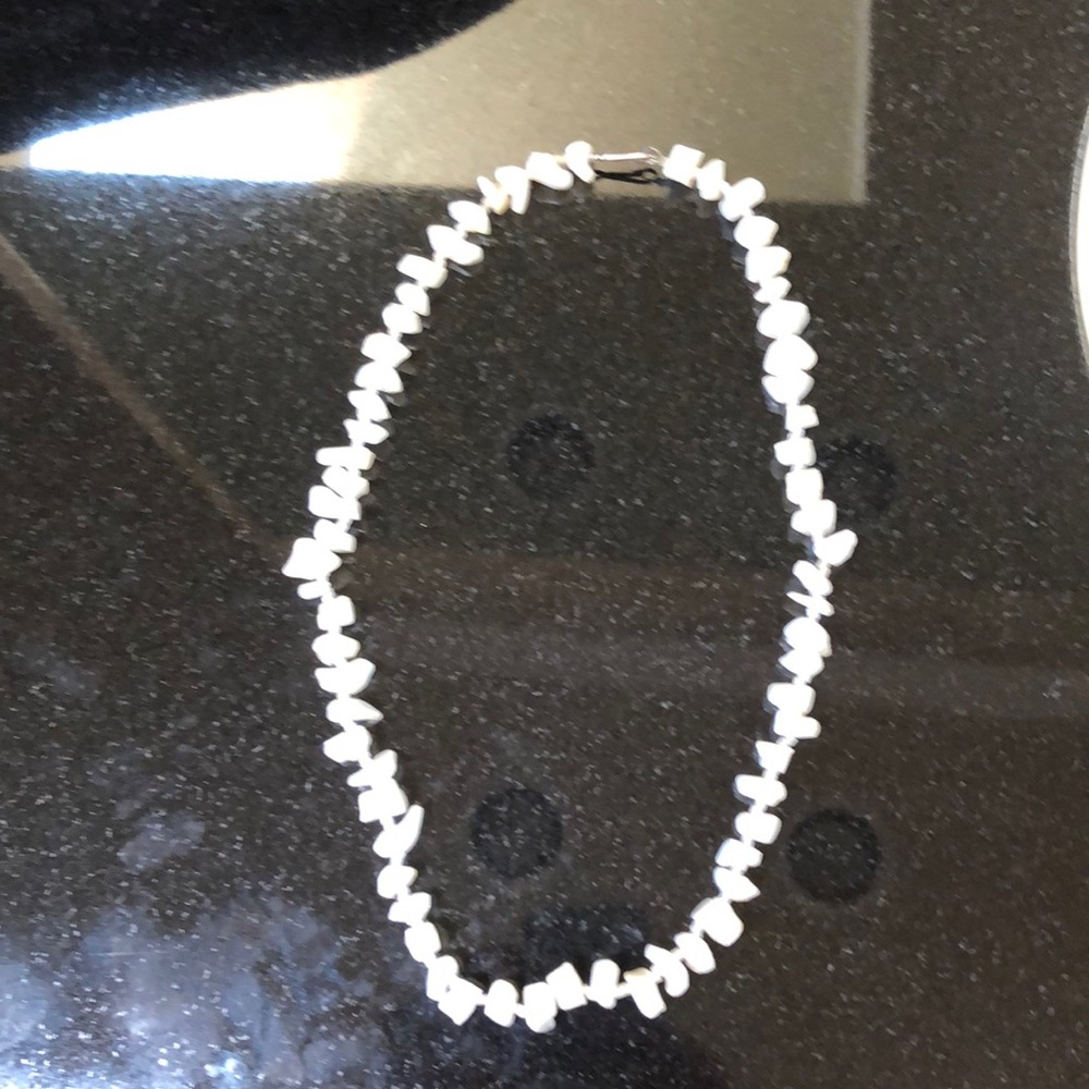 Ivory colored pearl like necklace